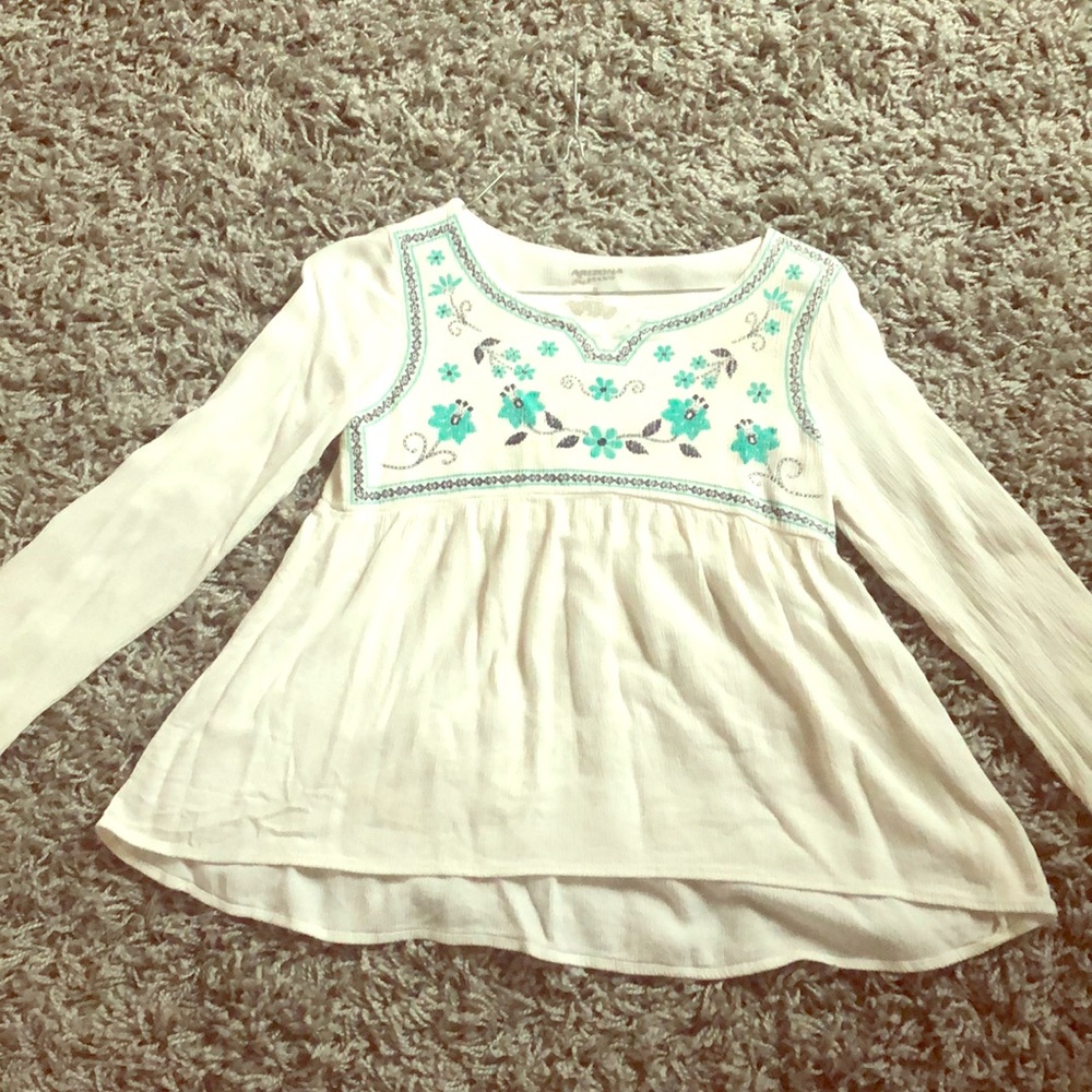 White shirt, with blue, & dark blue flowers.